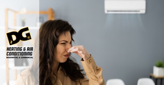 Woman holds nose while air conditioner runs.